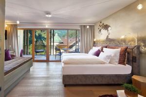 Posteľ alebo postele v izbe v ubytovaní ZillergrundRock Luxury Mountain Resort