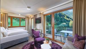 Posteľ alebo postele v izbe v ubytovaní ZillergrundRock Luxury Mountain Resort + 37 fotografií