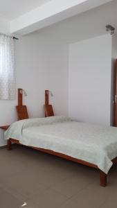 Postel nebo postele na pokoji v ubytování Casa Patio
