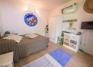 A bed or beds in a room at Il Gamberino