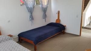 Postel nebo postele na pokoji v ubytování Casa Patio