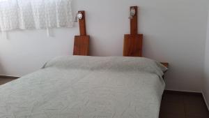 Postel nebo postele na pokoji v ubytování Casa Patio
