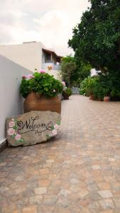 Vonkajšia záhrada v ubytovaní Melissa Apartments, Studios & Suites