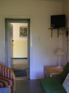 TV a/nebo společenská místnost v ubytování Fredrika Hotell Jakt&Fiskecamp