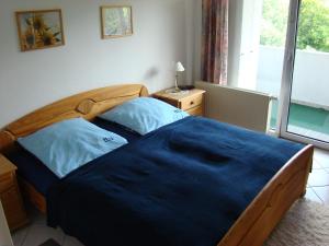 Łóżko lub łóżka w pokoju w obiekcie Apartment Angelique