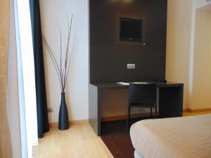 TV a/nebo společenská místnost v ubytování Hotel Ortuella