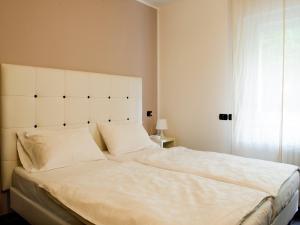 Postel nebo postele na pokoji v ubytování Hotel Asterix
