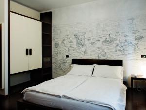 Postel nebo postele na pokoji v ubytování Hotel Asterix