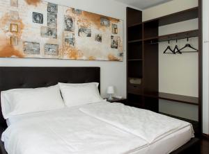 Postel nebo postele na pokoji v ubytování Hotel Asterix