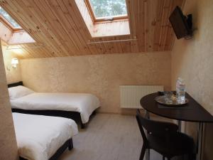 Postel nebo postele na pokoji v ubytování Kolmark Residence