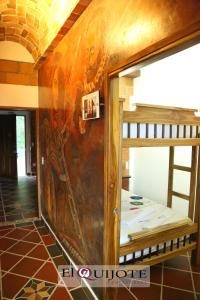 El Quijote Apartahotel emeletes ágyai egy szobában