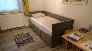 Ein Bett oder Betten in einem Zimmer der Unterkunft Haus Schmid Mattsee