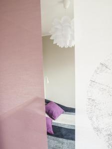 Posteľ alebo postele v izbe v ubytovaní Apartament Plaza48