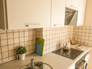 Kuchyňa alebo kuchynka v ubytovaní Apartament Plaza48