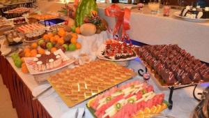 a buffet with many different types of food on a table at Petra Sella Hotel in Wadi Musa