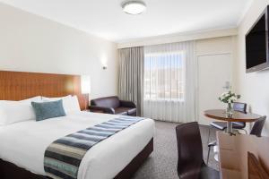 BreakFree Queanbeyan客房内的一张或多张床位