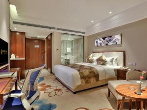 Sjónvarps- og/eða afþreyingartæki á Qin Huang Yong An Hotel
