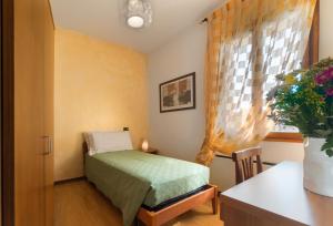 Un pat sau paturi într-o cameră la Country Hotel Al Gallo