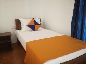 Postel nebo postele na pokoji v ubytování Mathews Holiday Resort