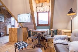 Posedenie v ubytovaní Apartamenty Rockus LUX & SPA Zakopane