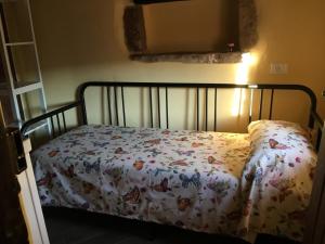 Letto o letti in una camera di Alloggio del Grand Tour