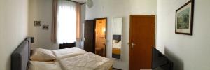 Postel nebo postele na pokoji v ubytování Hotel Haus Wagner