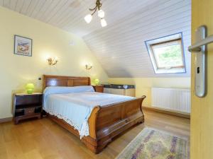 a bedroom with a large bed in a attic at Villa 100 meters from the Atlantic in Plounéour-Trez +32 photos