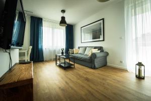Posedenie v ubytovaní Apartament w Piszu