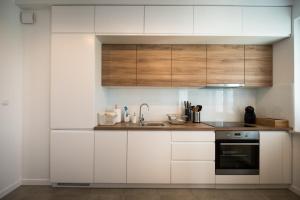 Kuchyňa alebo kuchynka v ubytovaní Apartament w Piszu