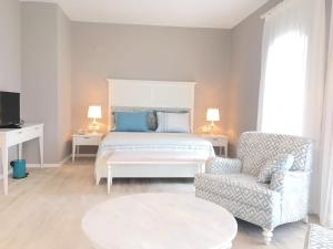 Postel nebo postele na pokoji v ubytování Datca Doris Hotel