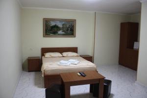 Postel nebo postele na pokoji v ubytování Paradise Hotel