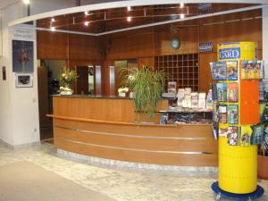 a store front with a counter in a building at Terrassenhotel Reichmann in Sankt Kanzian