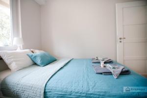 Кровать или кровати в номере Warsaw Concierge Polin Apartment