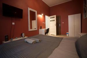 Posteľ alebo postele v izbe v ubytovaní Apartamenty Nowy Rynek