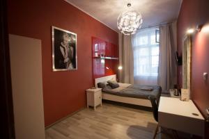 Posteľ alebo postele v izbe v ubytovaní Apartamenty Nowy Rynek
