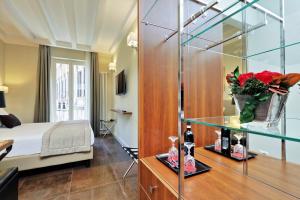 Letto o letti in una camera di Piazza Venezia Grand Suite