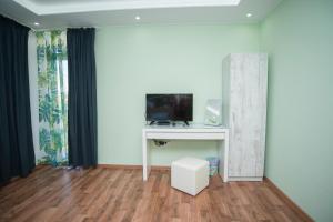 Μια τηλεόραση ή/και κέντρο ψυχαγωγίας στο Apartment Nikol