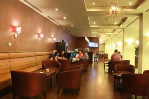 The lounge or bar area at Grand Palace Hotel