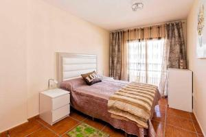 Postel nebo postele na pokoji v ubytování Apartment in Golf del sur
