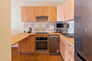 Kuchyň nebo kuchyňský kout v ubytování Apartment in Golf del sur