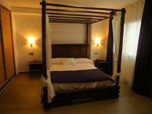 Postel nebo postele na pokoji v ubytování HOTEL MAÑET