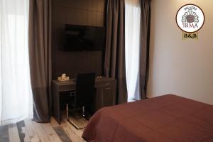 Postel nebo postele na pokoji v ubytování Palazzo IrMa - Hotel - B&B Luxury