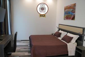 Postel nebo postele na pokoji v ubytování Palazzo IrMa - Hotel - B&B Luxury