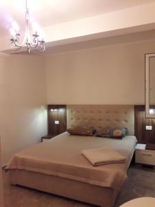 Postel nebo postele na pokoji v ubytování Apartments Lux Life