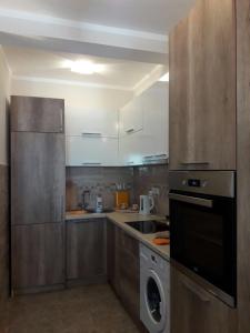 Kuchyň nebo kuchyňský kout v ubytování Apartments Lux Life
