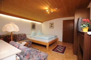 Кровать или кровати в номере Haus Moosbrugger