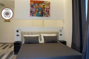 Postel nebo postele na pokoji v ubytování Palazzo IrMa - Hotel - B&B Luxury