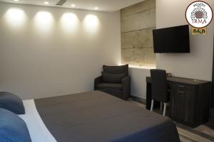 TV a/nebo společenská místnost v ubytování Palazzo IrMa - Hotel - B&B Luxury