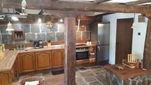 A kitchen or kitchenette at Pisanata House