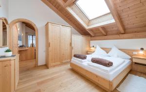 Кровать или кровати в номере Apartment Lodge Gasserhof
